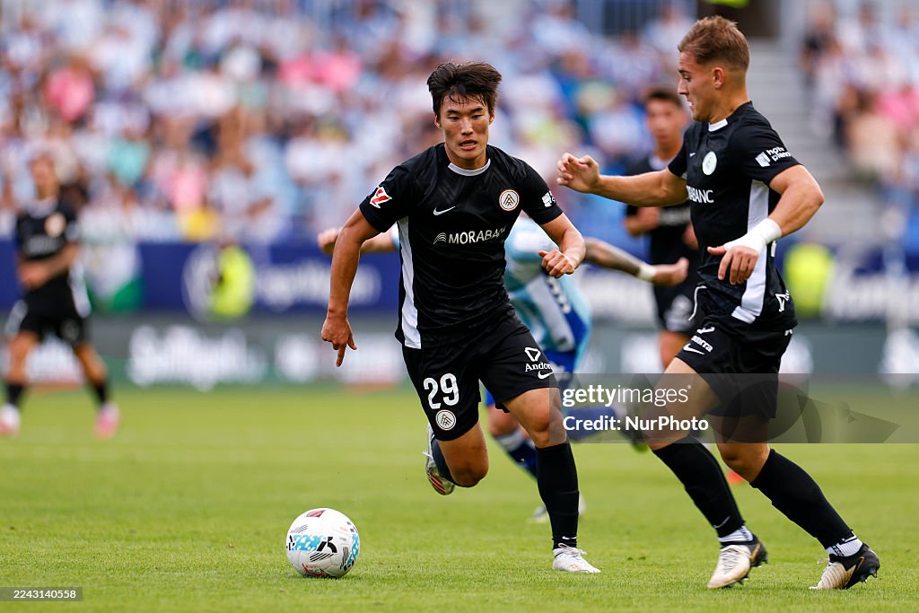 Min su Kim Of FC Andorra Runs With The Ball During The La Liga News min-su-kim-of-fc-andorra-runs-with-the-ball-during-the-la-liga-news