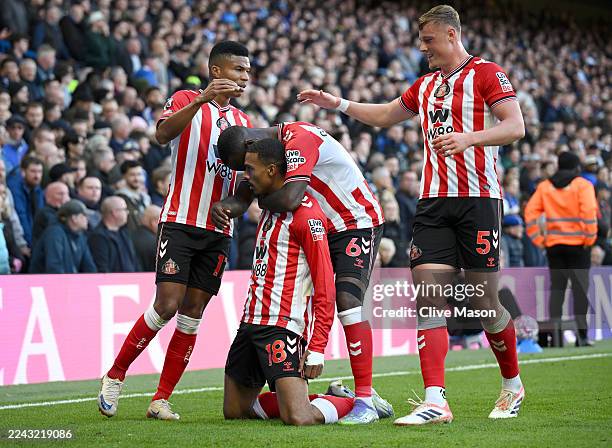 Wilson Isidor of Sunderland celebrates scoring his team's first goal with teammates Reinildo Mandava, Lutsharel Geertruida and Daniel Ballard during...