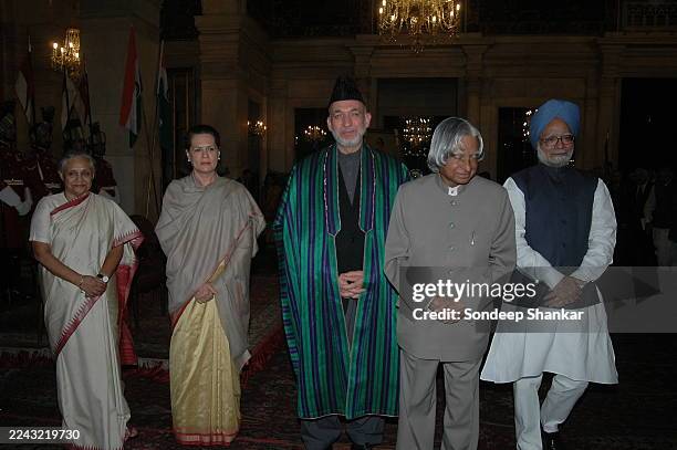 Afghanistan President Hamid Karzai, recipient of the Indira Gandhi Peace Prize, is seen with President Abdul Kalam, Prime Minister Manmohan Singh,...