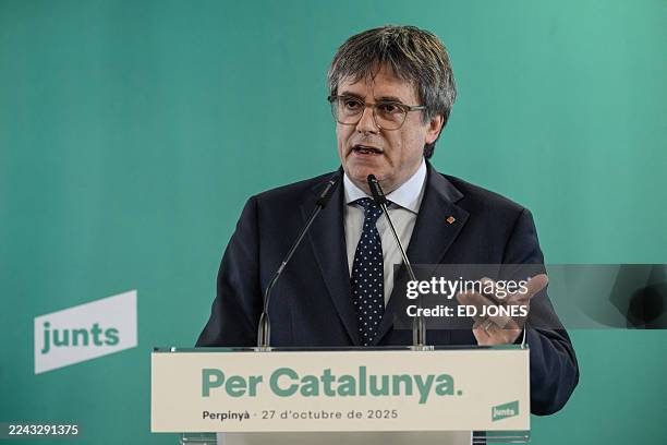 Exiled Catalan independence leader and MEP Carles Puigdemont speaks during a press conference following a Junts per Catalunya party meeting in...