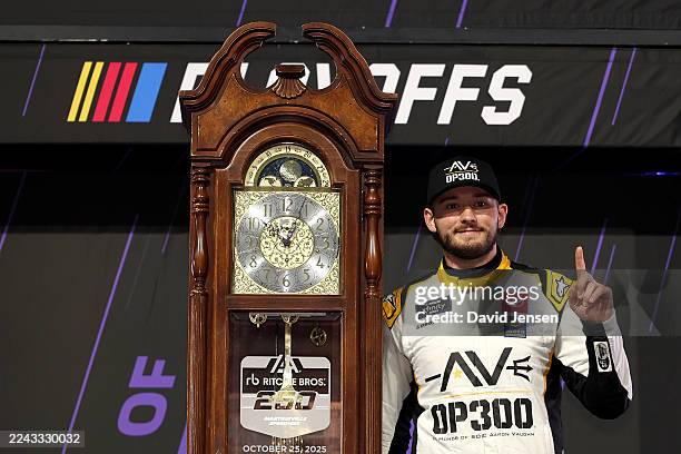 Taylor Gray, driver of the Operation 300 Toyota, celebrates in victory lane after winning the NASCAR Xfinity Series IAA and Ritchie Bros. 250 at...