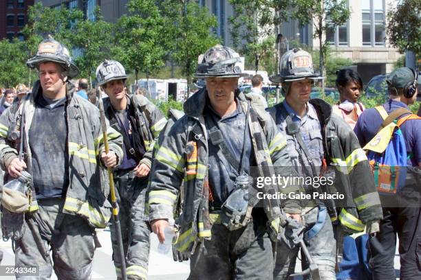 Streets of lower Manhattan with fireman, police, and rescue crews after the colapse of the World Trade Center after being hit by two airplanes on...