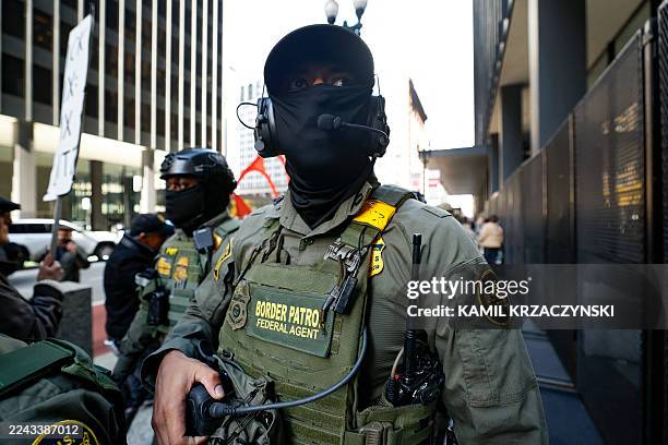 Federal agents arrive at the Dirksen Federal Building to pick up US Customs and Border Patrol Commander Gregory Bovino after his hearing at federal...