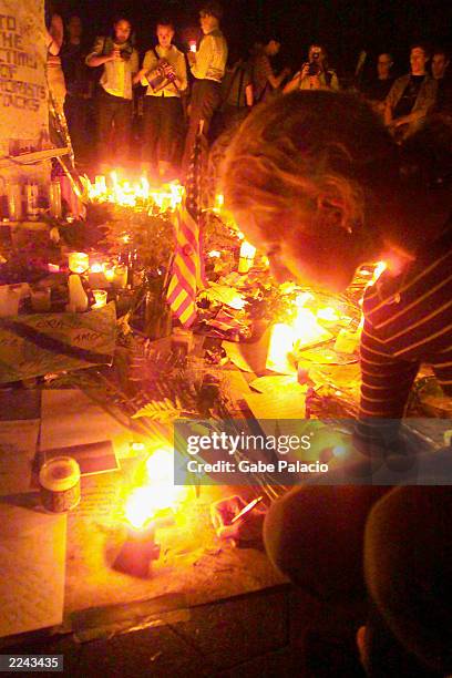 New Yorkers have set up a monument with the words " to the victims of terrorist attacks" and a candlelight vigil with notes and gifts to commerate...