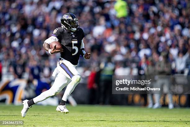 Tyler Huntley of the Baltimore Ravens runs with the ball during an NFL football game against the Chicago Bears at M&T Bank Stadium on October 26,...
