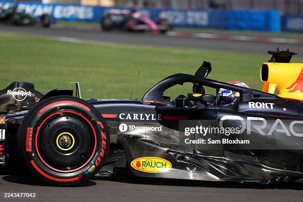 Third placed Max Verstappen of the Netherlands and Oracle Red Bull Racing celebrates on his way to parc ferme during the F1 Grand Prix of Mexico at...