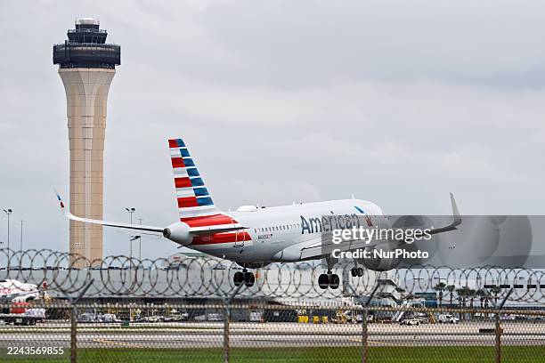 An American Airlines airplane approaches Miami International Airport for landing in Miami, Florida.