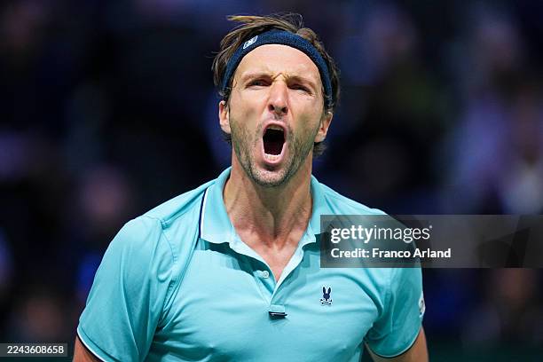 Arthur Rinderknech of France celebrates a point against Fabian Marozsan of Hungary of during day one of the Rolex Paris Masters 2025 on October 27,...