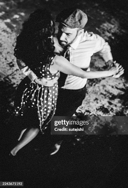 closeness in the rhythm of the night. - jive dancing stock pictures, royalty-free photos & images