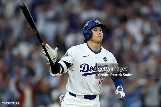 Shohei Ohtani of the Los Angeles Dodgers hits a home run against the Toronto Blue Jays during the third inning in game three of the 2025 World Series...