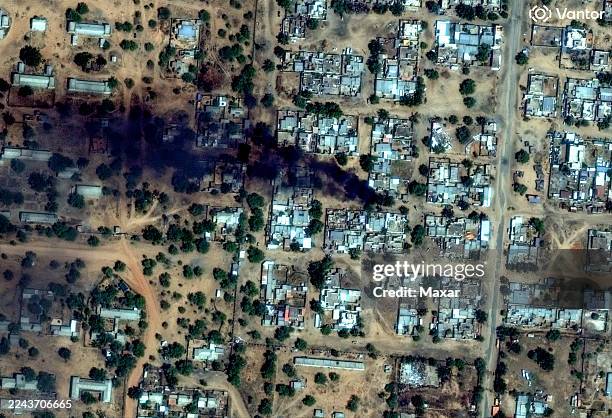 Vantor close-up satellite imagery reveals dense black smoke rising from a fire in a residential area near El Fasher airport. Please use: Satellite...