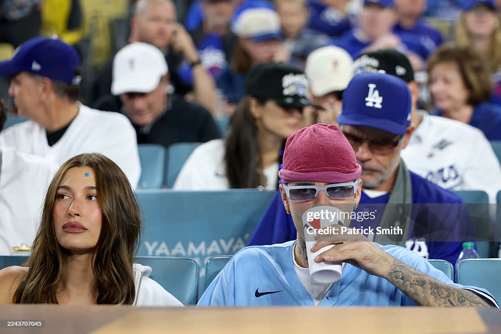 Justin Bieber and Hailey Bieber watch game three of the 2025 World
