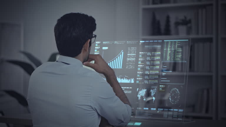https://media.gettyimages.com/id/2243707564/video/back-view-of-a-businessman-analyzing-a-futuristic-data-dashboard-with-charts-and-global.jpg?b=1&s=640x640&k=20&c=3t_4c4qegk0myixkURuFmCuD1M4F2YBMki1AUi_uM9g=