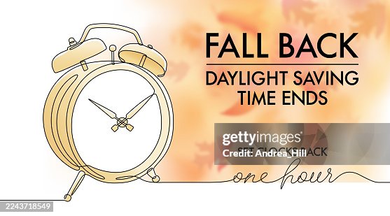 Fall Back Daylight Saving TIme Reminder Message with Alarm Clock and Bokeh Falling Leaves Fall Back Daylight Saving TIme Reminder Message with Alarm Clock and Bokeh Falling Leaves