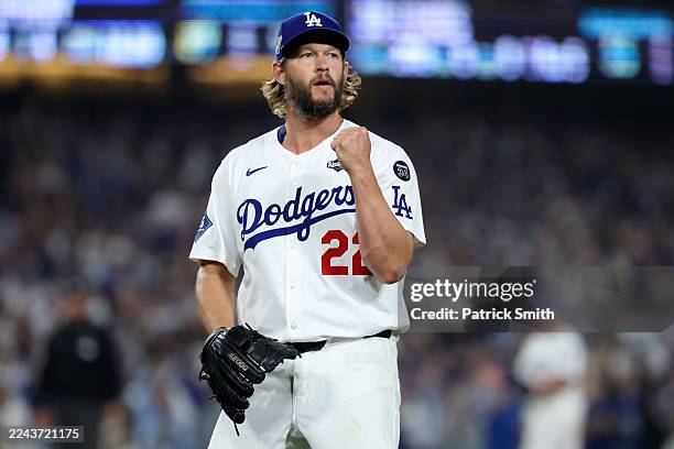 Clayton Kershaw of the Los Angeles Dodgers reacts after pitching the 12th inning against the Toronto Blue Jays in game three of the 2025 World Series...
