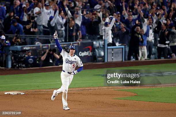 Freddie Freeman of the Los Angeles Dodgers rounds the bases after hitting a walk-off home run during the 18th inning against the Toronto Blue Jays in...