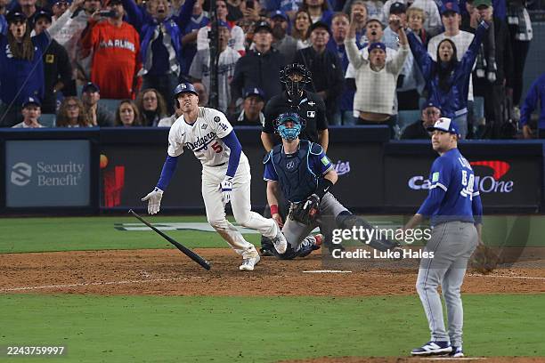 Freddie Freeman of the Los Angeles Dodgers hits a walk-off solo home run against the Toronto Blue Jays during the 18th inning in game three of the...