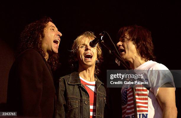 Steve Augeri of Journey, Tommy Shaw and Lawrence Gowen of Styx performing at the "Volunteers for America" rock benefit concert at the HiFi Buys...