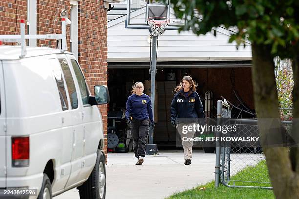 Members of the FBI Joint Terrorism Task Force search a home in Dearborn, Michigan, on October 31, 2025. FBI Director Kash Patel said Friday that the...