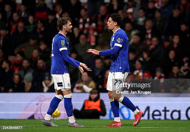 Yousef Salech of Cardiff City celebrates scoring his team's first goal with teammate Calum Chambers during the Carabao Cup Fourth Round match between...