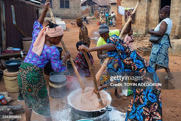 People prepare food during the Awon mass wedding in Shao, Kwara State, on October 31, 2025. The mass wedding is a festival among the people of Shao...