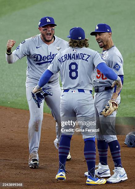 Toronto, Ontario, Canada October 31, 2025: Los Angeles Dogders Miguel Rojas, left, and Los Angeles Dodgers shortstop Mookie Betts , right,...