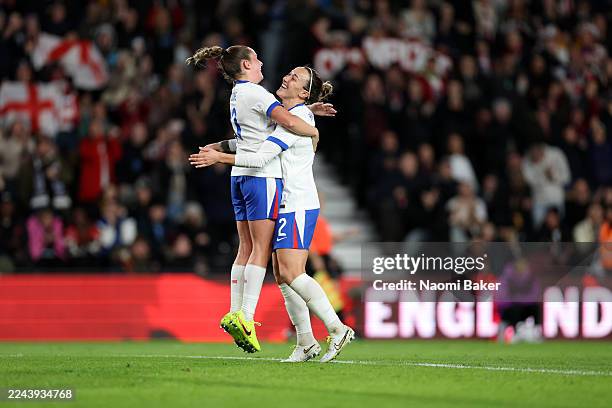 Lucy Bronze of England celebrates after scoring her teams second goal with Ella Toone of England during the Women's international friendly between...