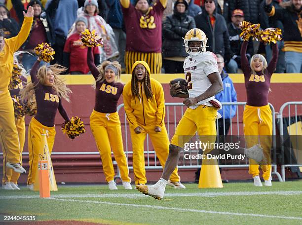 Quarterback Jeff Sims of the Arizona State Sun Devils runs in a touchdown in the second half of play against the Iowa State Cyclones at Jack Trice...