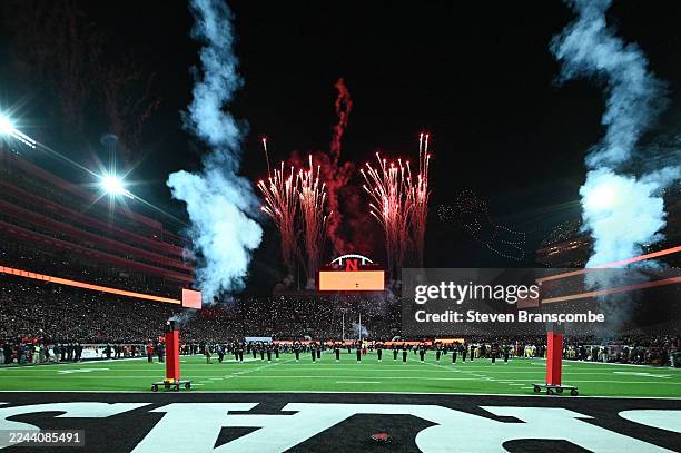Fans watch a light show during a break in the game between the Nebraska Cornhuskers and the USC Trojans during the second half at Memorial Stadium on...
