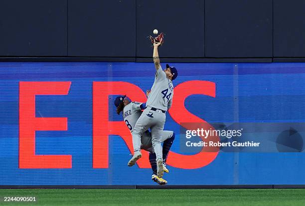 Toronto, Ontario, Saturday, November 1, 2025 - Los Angeles Dodgers center fielder Andy Pages reaches to catch the fly ball hit by Toronto Blue Jays'...