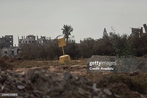 Yellow concrete block, placed by Israeli army, is seen in the buffer zone east of Deir Al-Balah in the central Gaza Strip on November 2, 2025. The...