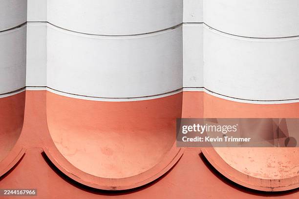 abstract architectural detail in coral and white - coral colored stock pictures, royalty-free photos & images