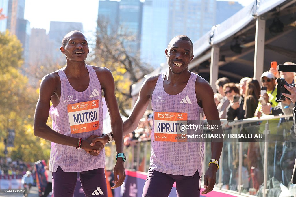 Alex Mutiso Kenyans Benson Kipruto and Alexander Mutiso celebrate taking first ...