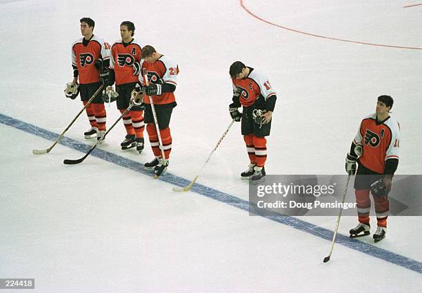 The Philadephia Flyers line up on the ice, left to right: Pat Falloon, Eric Desjardins , Karl Dykhuis , Rod Brind'Amour and John LeClair, to start...