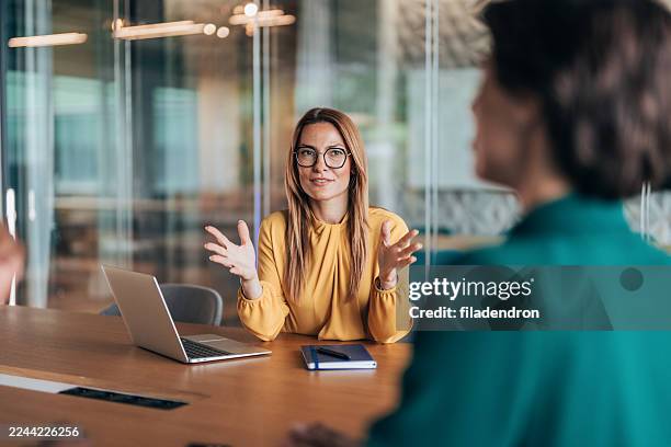 business meeting for new agreement - executive director stock pictures, royalty-free photos & images