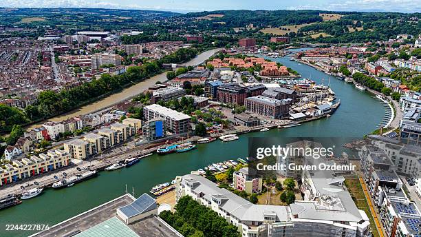 aerial view of bristol harbourside with river avon, modern waterfront apartments, colorful houses and boats, urban landscape and maritime heritage concept for travel and design - bristol cathedral stock pictures, royalty-free photos & images