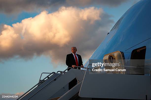 President Donald Trump boards Air Force One en route to the White House on November 2, 2025 at Palm Beach International Airport in West Palm Beach,...