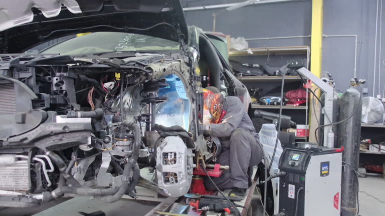https://media.gettyimages.com/id/2244282735/video/mechanic-welds-carcass-of-car-after-accident-in-repair-shop.jpg?b=1&s=640x640&k=20&c=ff6Ne5buzeHOgqTy7KQYk46Dl468kDnFkBbF0BaeDfc=
