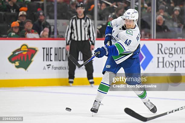 Vancouver Canucks forward Elias Pettersson takes a shot during a NHL game between the Minnesota Wild and Vancouver Canucks on November 1 at Grand...