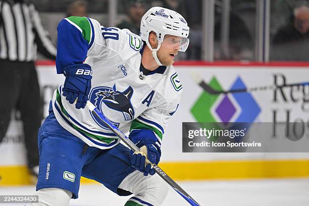 Vancouver Canucks forward Elias Pettersson controls the puck during a NHL game between the Minnesota Wild and Vancouver Canucks on November 1 at...