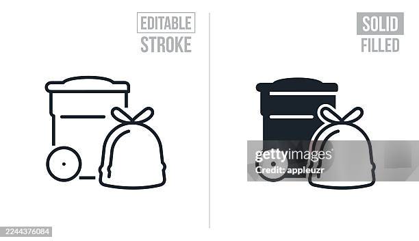 filled trash bag next to garbage can - editable stroke and solid icons - trash bag stock illustrations