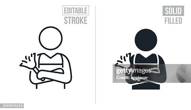person with arms crossed holding feather duster - editable stroke and solid icons - feather duster stock illustrations