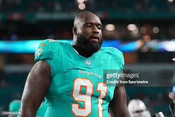Miami Dolphins defensive tackle Matthew Butler goes to the locker room after pregame warmup before the game between the Baltimore Ravens and the...