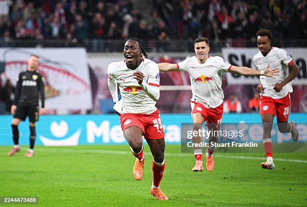 Yan Diomande of RB Leipzig celebrates scoring his team's second goal during the Bundesliga match between RB Leipzig and VfB Stuttgart at Red Bull...