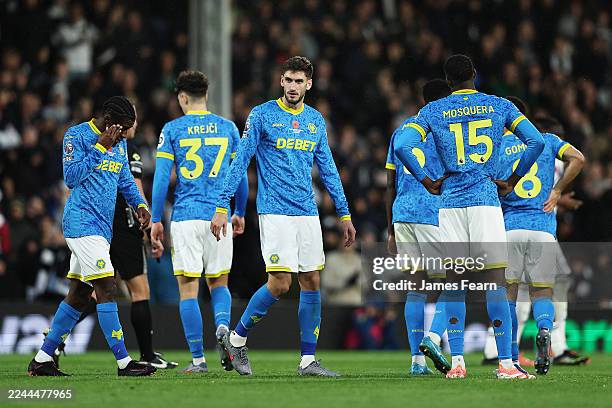 Jean-Ricner Bellegarde and Santiago Bueno of Wolverhampton Wanderers reacts after their team conceded a second goal during the Premier League match...