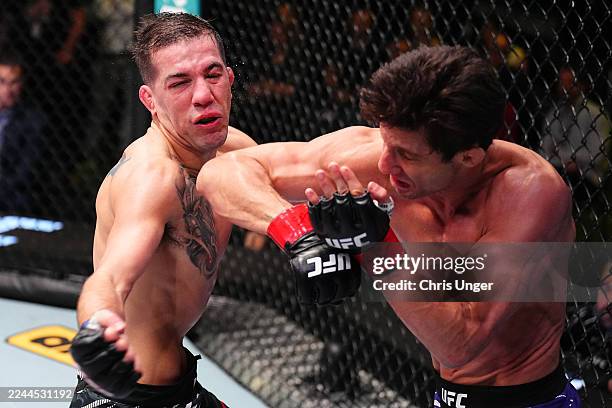 Allan Nascimento of Brazil elbows Cody Durden in a 130-pound catchweight fight during the UFC Fight Night event at UFC APEX on November 01, 2025 in...