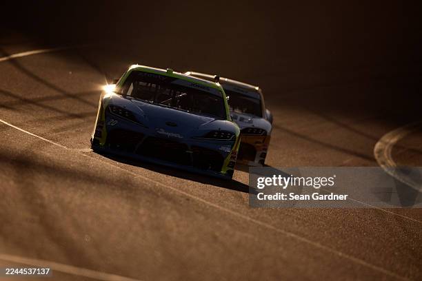Brandon Jones, driver of the Menards/Magicwood Toyota, and Taylor Gray, driver of the Operation 300 Toyota, lead the field during the NASCAR Xfinity...