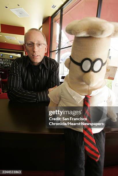 Scott Adams, creator of the Dilbert cartoon character, poses for a portrait at Stacey's Cafe in Pleasanton, Calif. On Feb. 21, 2005. He designed...