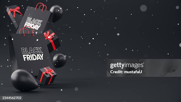 concepto de black friday de caja de regalo, globos y bolsa de compras sobre fondo negro - black friday fotografías e imágenes de stock
