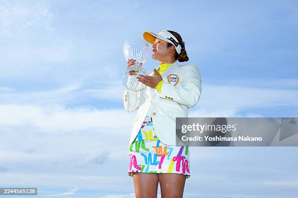 Kano Nakamura of Japan kisses the trophy after winning the tournament following the final round of Hisako Higuchi Mitsubishi Electric Ladies Golf...